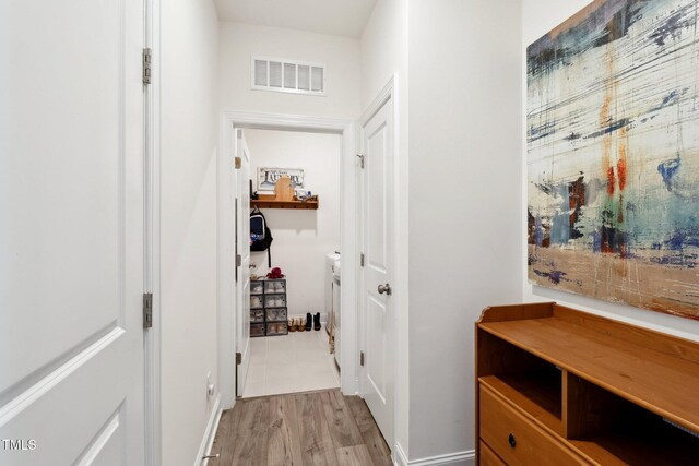 404 Porterfield Dr, Youngsville, NC 27596 - hallway featuring wood finished floors