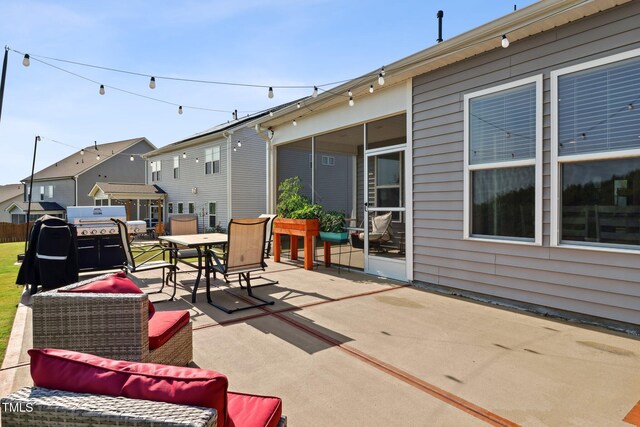 404 Porterfield Dr, Youngsville, NC 27596 - view of patio / terrace with outdoor dining space