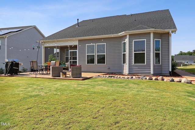 404 Porterfield Dr, Youngsville, NC 27596 - back of house with a lawn, a sunroom, and a patio