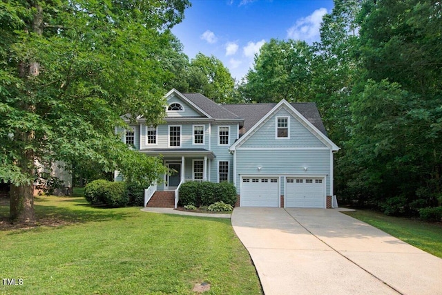 1128 Neuse Ridge Dr, Clayton, NC 27527 - view of front of home with driveway, a garage, a front yard, a porch, and brick siding
