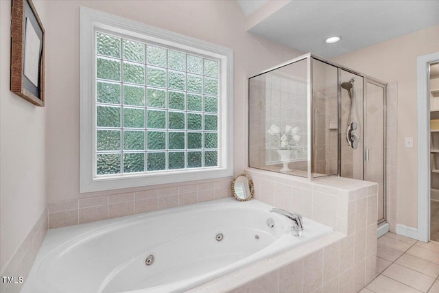 1128 Neuse Ridge Dr, Clayton, NC 27527 - full bathroom with a tub with jets, a stall shower, and tile patterned floors