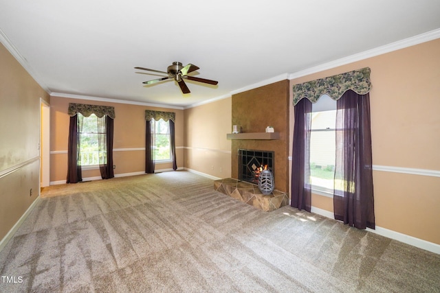 1006 Apache Ln, Apex, NC 27502 - unfurnished living room with crown molding, a fireplace, ceiling fan, baseboards, and carpet floors