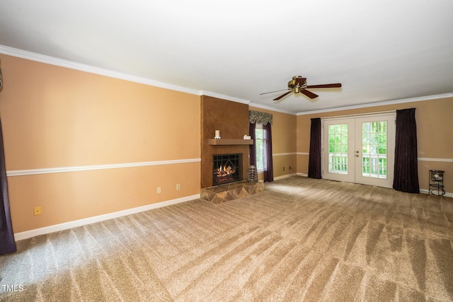 1006 Apache Ln, Apex, NC 27502 - unfurnished living room featuring crown molding, french doors, ceiling fan, carpet, and baseboards