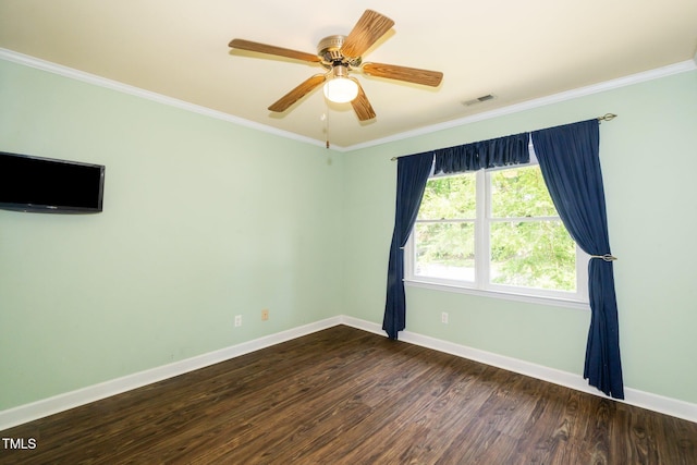 1006 Apache Ln, Apex, NC 27502 - spare room with baseboards, ornamental molding, dark wood-type flooring, and ceiling fan