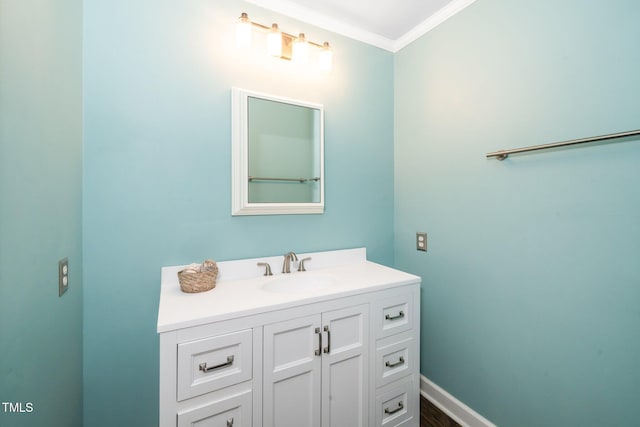1006 Apache Ln, Apex, NC 27502 - bathroom featuring ornamental molding and vanity