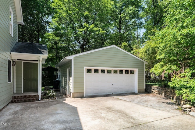 1006 Apache Ln, Apex, NC 27502 - detached garage featuring view of wooded area