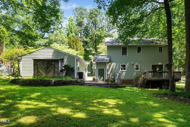 1006 Apache Ln, Apex, NC 27502 - back of house featuring a wooden deck and a yard