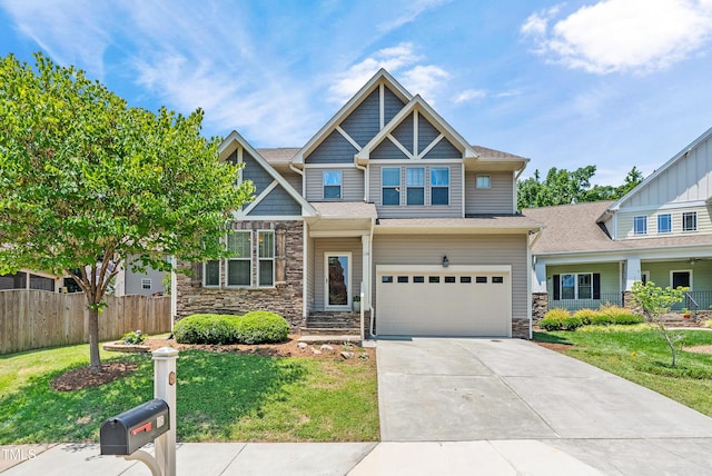 118 Fox Run Ct, Durham, NC 27705 - craftsman house featuring stone siding, driveway, and a garage