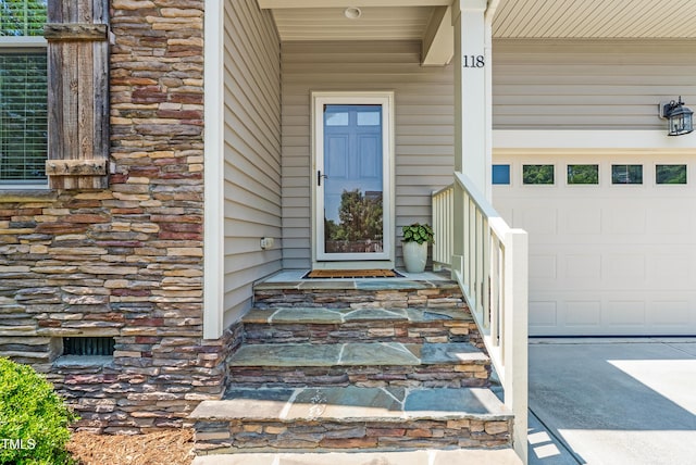 118 Fox Run Ct, Durham, NC 27705 - view of exterior entry with stone siding and covered porch