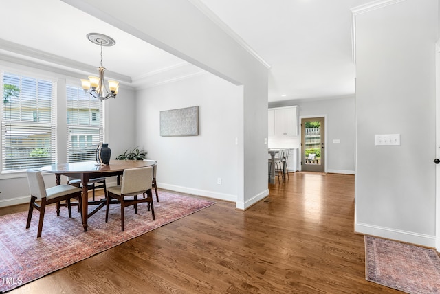 118 Fox Run Ct, Durham, NC 27705 - dining room featuring baseboards, dark wood-style floors, ornamental molding, and a chandelier