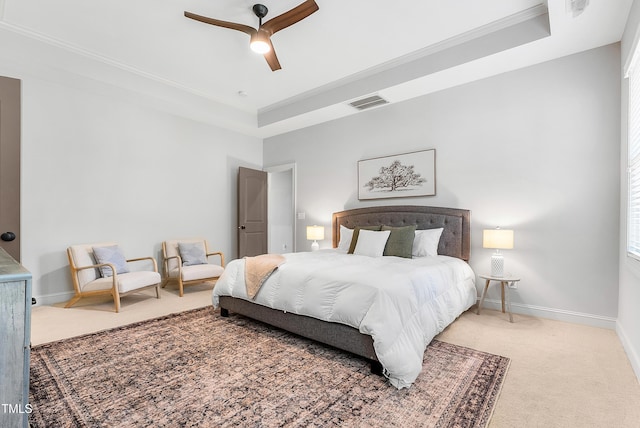 118 Fox Run Ct, Durham, NC 27705 - carpeted bedroom with ornamental molding, baseboards, a raised ceiling, and ceiling fan