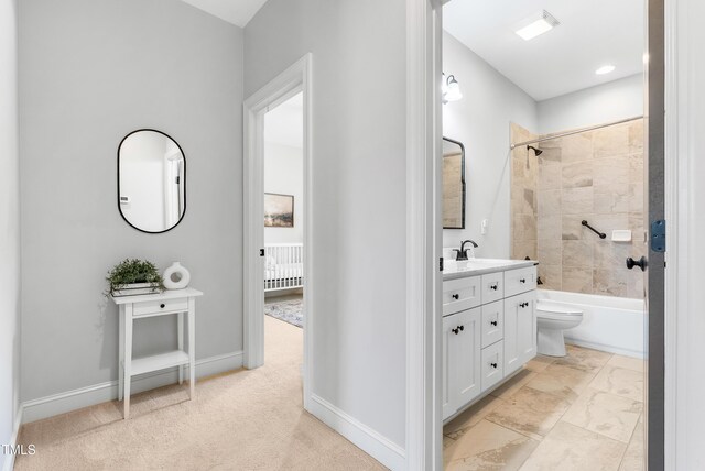 118 Fox Run Ct, Durham, NC 27705 - bathroom featuring vanity, bathing tub / shower combination, baseboards, and toilet