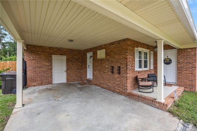 701 Dandridge Dr, Fayetteville, NC 28304 - view of patio featuring an attached carport