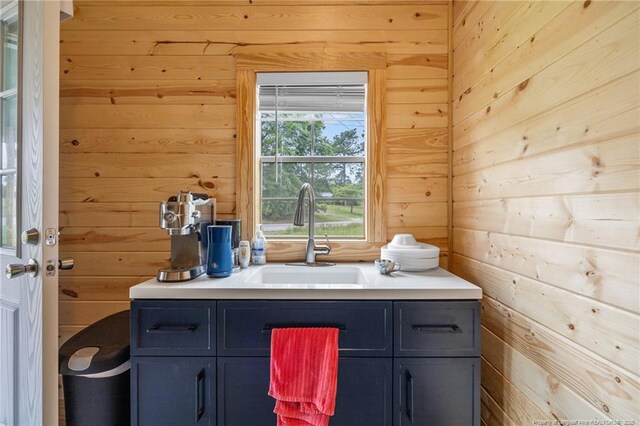 701 Dandridge Dr, Fayetteville, NC 28304 - bathroom with wooden walls and vanity