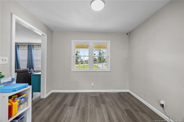 701 Dandridge Dr, Fayetteville, NC 28304 - empty room with dark wood finished floors and baseboards