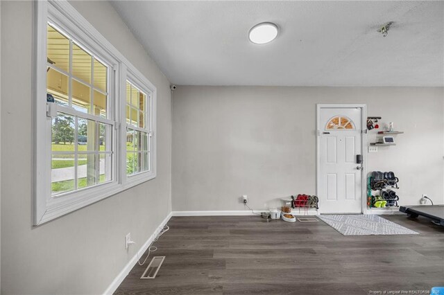 701 Dandridge Dr, Fayetteville, NC 28304 - foyer entrance with baseboards and wood finished floors