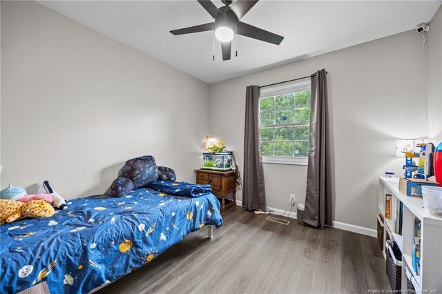 701 Dandridge Dr, Fayetteville, NC 28304 - bedroom featuring wood finished floors, baseboards, and a ceiling fan