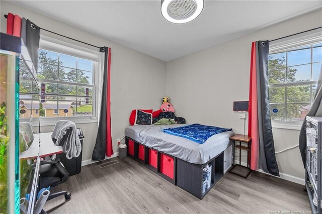 701 Dandridge Dr, Fayetteville, NC 28304 - bedroom with wood finished floors and baseboards