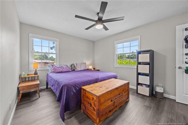 701 Dandridge Dr, Fayetteville, NC 28304 - bedroom featuring wood finished floors, baseboards, and ceiling fan