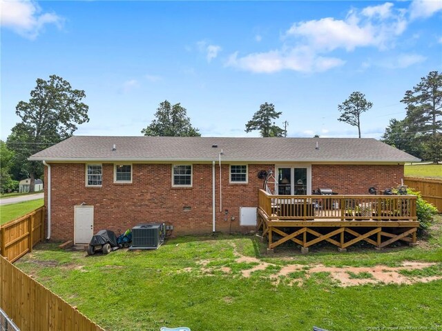 701 Dandridge Dr, Fayetteville, NC 28304 - back of house with a deck, brick siding, central AC, and roof with shingles