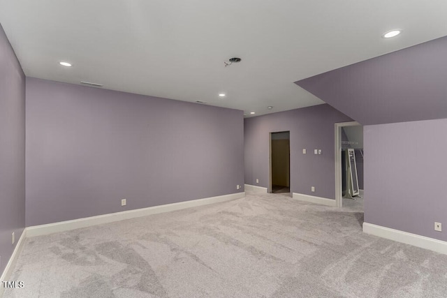 166 Bonica Creek Dr, Garner, NC 27529 - spare room featuring light colored carpet, recessed lighting, and baseboards