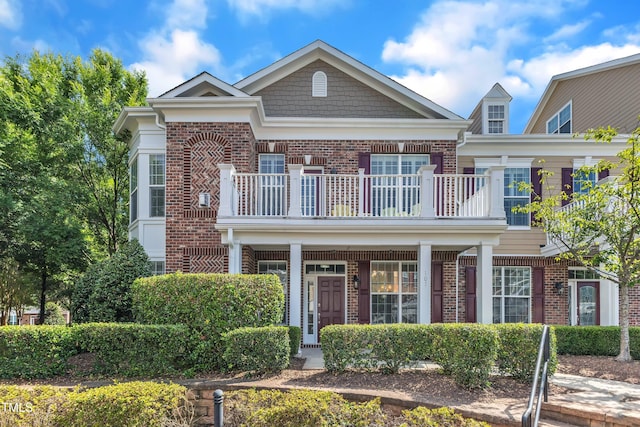 10511 Sablewood Dr Unit 107, Raleigh, NC 27617 - view of front of property with a balcony and brick siding