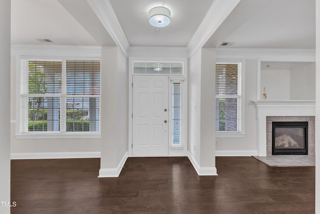 10511 Sablewood Dr Unit 107, Raleigh, NC 27617 - entryway featuring crown molding, wood finished floors, and a tile fireplace