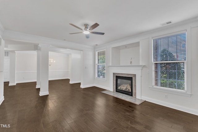 10511 Sablewood Dr Unit 107, Raleigh, NC 27617 - unfurnished living room with a ceiling fan, a fireplace, crown molding, wood finished floors, and ornate columns