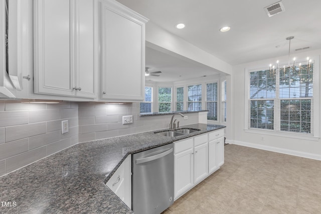 10511 Sablewood Dr Unit 107, Raleigh, NC 27617 - kitchen featuring stainless steel dishwasher, backsplash, white cabinetry, a peninsula, and recessed lighting