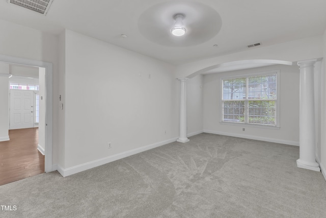 10511 Sablewood Dr Unit 107, Raleigh, NC 27617 - carpeted spare room featuring ornate columns and arched walkways