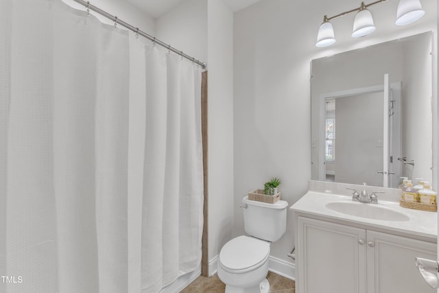 10511 Sablewood Dr Unit 107, Raleigh, NC 27617 - full bath featuring vanity, tile patterned flooring, and a shower with shower curtain