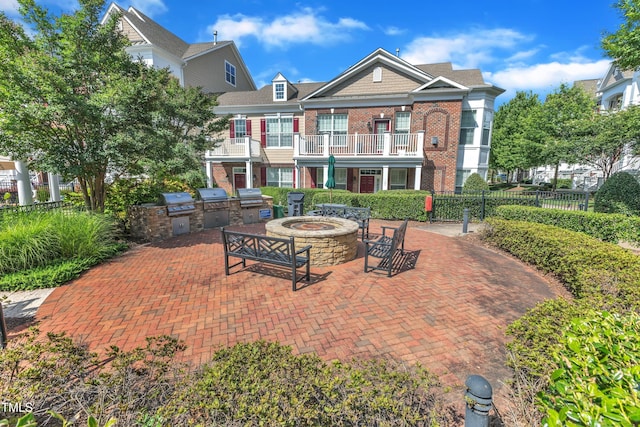 10511 Sablewood Dr Unit 107, Raleigh, NC 27617 - patio / terrace featuring area for grilling, an outdoor fire pit, and a patio
