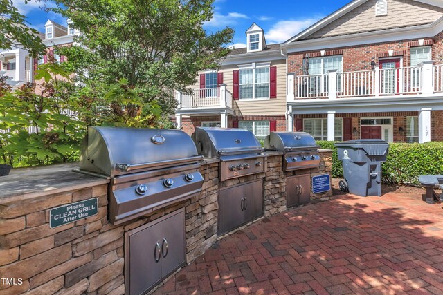10511 Sablewood Dr Unit 107, Raleigh, NC 27617 - view of patio / terrace with exterior kitchen