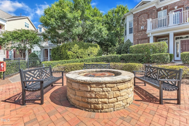 10511 Sablewood Dr Unit 107, Raleigh, NC 27617 - view of patio / terrace featuring an outdoor living space with a fire pit