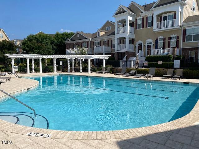 10511 Sablewood Dr Unit 107, Raleigh, NC 27617 - community pool with a pergola