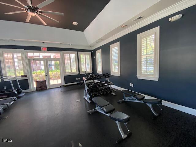 10511 Sablewood Dr Unit 107, Raleigh, NC 27617 - exercise room with french doors, crown molding, plenty of natural light, and ceiling fan