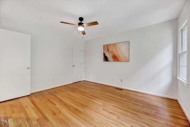1209 Lochcarron Ln, Cary, NC 27511 - empty room featuring wood finished floors, baseboards, and a ceiling fan