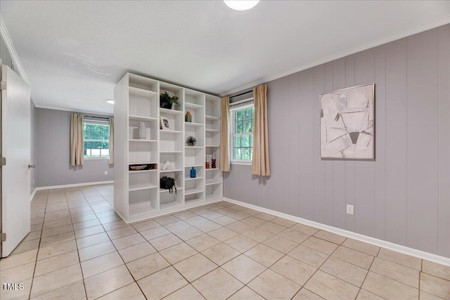 1209 Lochcarron Ln, Cary, NC 27511 - spare room with light tile patterned floors, crown molding, and baseboards