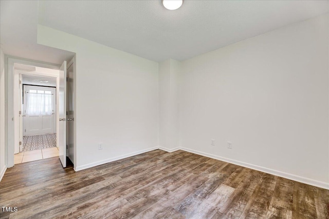 1209 Lochcarron Ln, Cary, NC 27511 - empty room featuring wood finished floors and baseboards