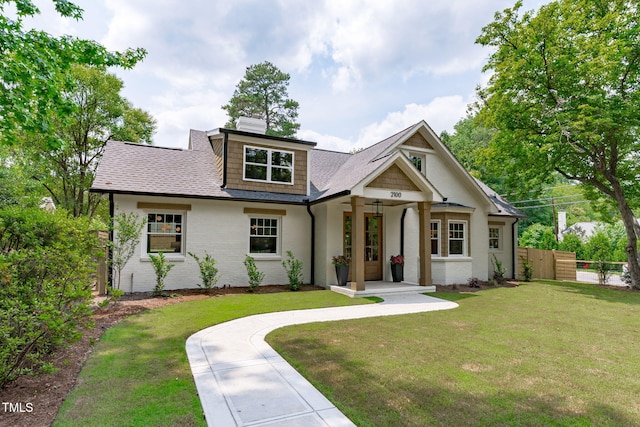 2100 Summit St, Durham, NC 27707 - view of front of home featuring a chimney, a shingled roof, and a porch