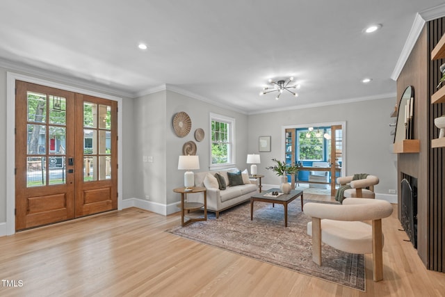 2100 Summit St, Durham, NC 27707 - living area with light wood-style floors, a fireplace, baseboards, recessed lighting, and ornamental molding