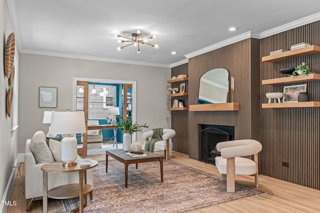 2100 Summit St, Durham, NC 27707 - living area with wood finished floors, ornamental molding, a chandelier, recessed lighting, and baseboards