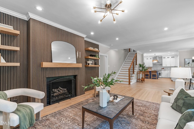 2100 Summit St, Durham, NC 27707 - living area featuring light wood-style flooring, ornamental molding, stairs, recessed lighting, and a chandelier