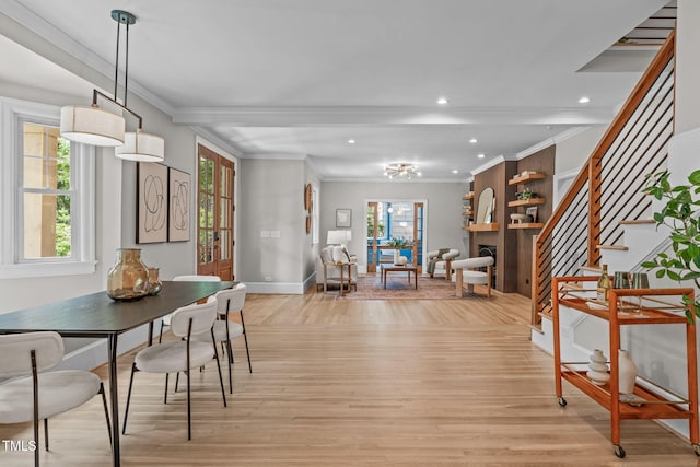 2100 Summit St, Durham, NC 27707 - dining room featuring crown molding, light wood-style flooring, recessed lighting, stairs, and baseboards