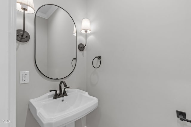 2100 Summit St, Durham, NC 27707 - bathroom with a sink and crown molding