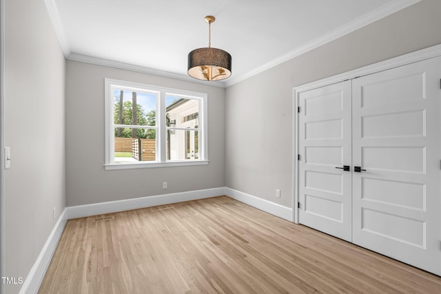 2100 Summit St, Durham, NC 27707 - unfurnished room featuring ornamental molding, baseboards, and light wood finished floors