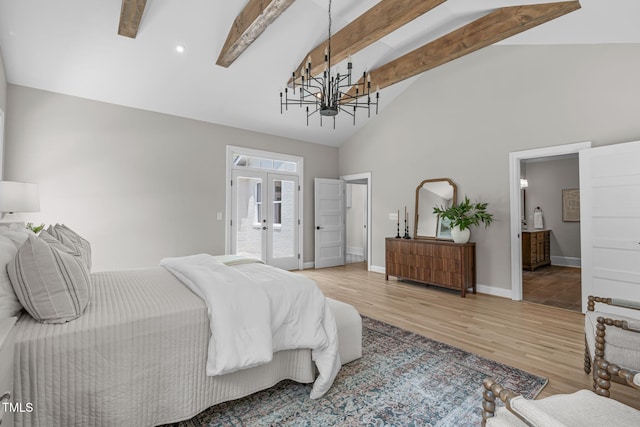 2100 Summit St, Durham, NC 27707 - bedroom with a chandelier, french doors, beamed ceiling, wood finished floors, and high vaulted ceiling
