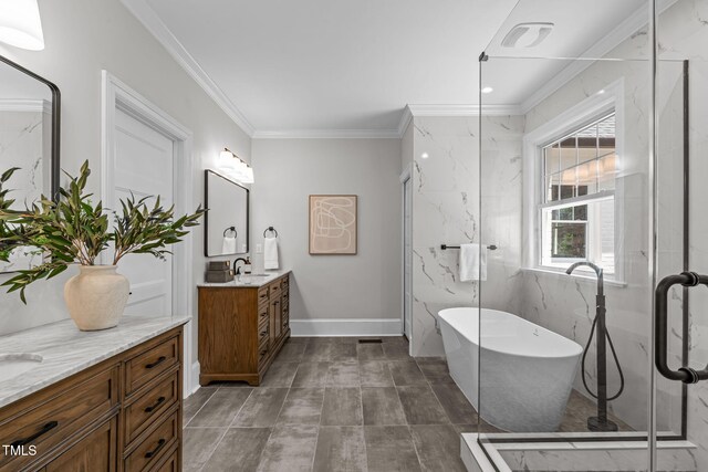 2100 Summit St, Durham, NC 27707 - full bathroom featuring two vanities, a freestanding tub, crown molding, a marble finish shower, and baseboards