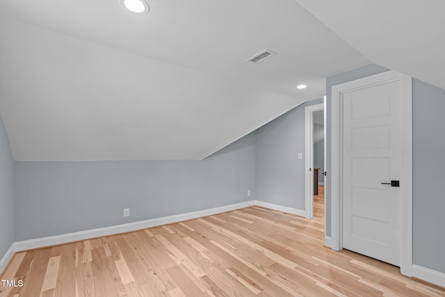 2100 Summit St, Durham, NC 27707 - additional living space featuring baseboards, lofted ceiling, light wood-type flooring, and recessed lighting