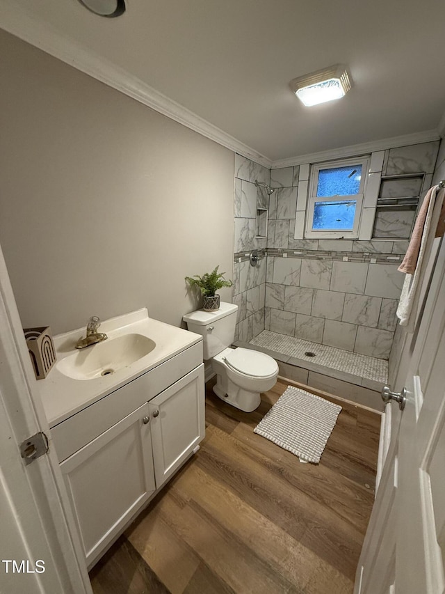 340 Jones Rd, Newton Grove, NC 28366 - full bathroom with toilet, vanity, a stall shower, crown molding, and wood finished floors